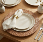Handmade round rattan-style placemat set (4-pack) with natural woven texture