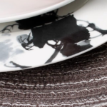 Western-style plate and tableware set; includes placemats and napkins; ideal for dining room and home table setups
