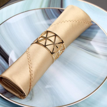 Patterned ceramic tableware set; includes plates, placemats, and napkins; suitable for kitchen and dining tables